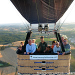balloon in flight over tuscany