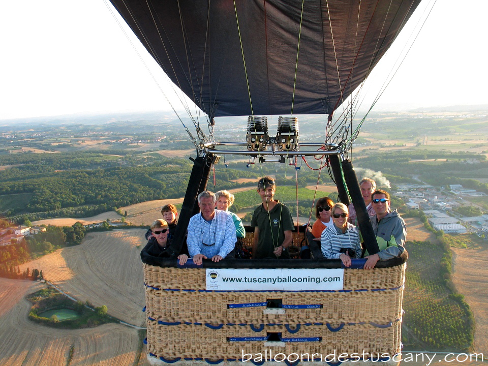 balloon in flight over tuscany